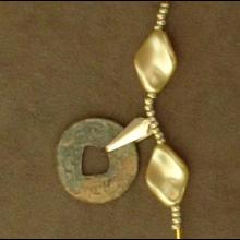 Collier avec deux pi�ces en bronze Song